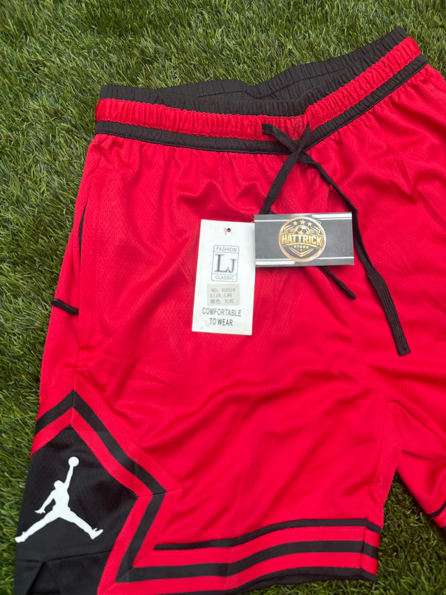 Short Jordan Rojo( jumpman blanco)